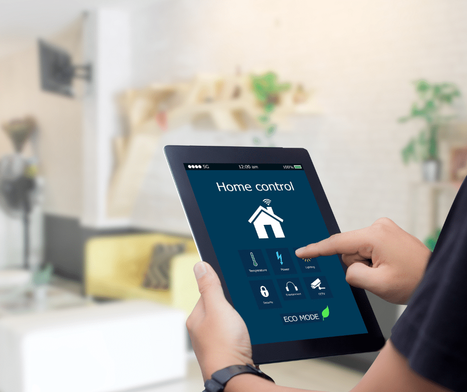 A person using a tablet to control their smart home features