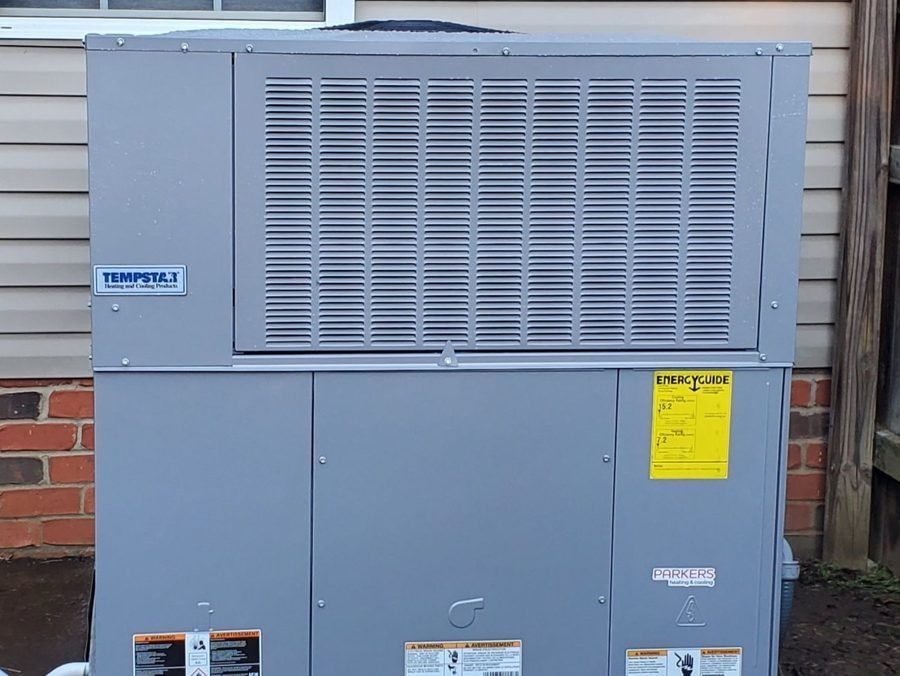 Commercial heating unit installed exterior.